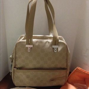Used once  in excellent condition Tumi monogram Signature women's briefcase bag
